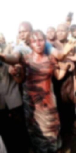 Angry Mob Beat N Pound Lady For Allegedly Kidnapping Children In Nasarawa - Watch